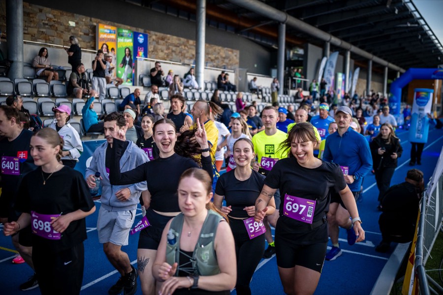 Runners smiling during the race